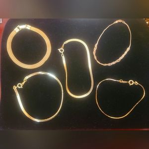 5 Gold tone wearable bracelets